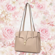 Load image into Gallery viewer, A beige, minimalist design shoulder bag made of leather, featuring a compact and spacious structure with a front flap and a metallic buckle.